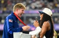 Tara Davis-Woodhall and her husband celebrate the latter's triumph at the Paris Paralympics (Image Source: Getty)